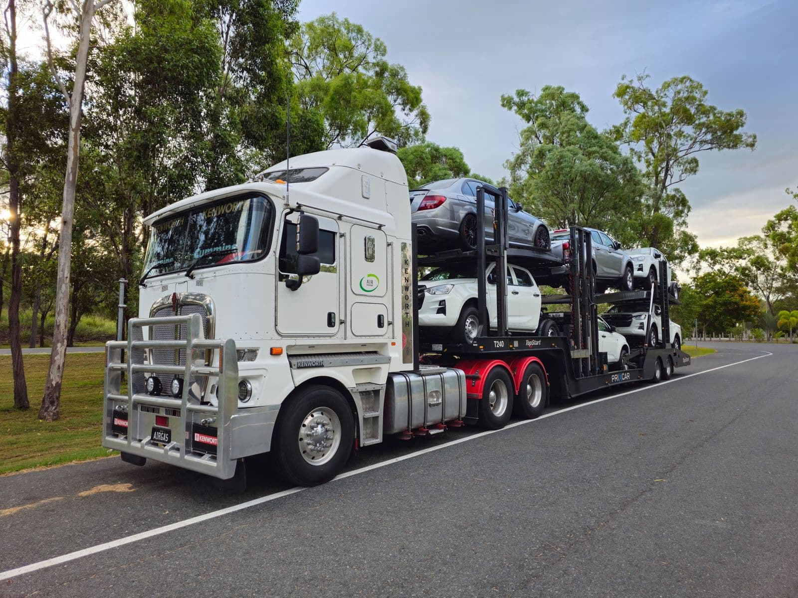Vehicles loaded on a car carrier trailer for transport